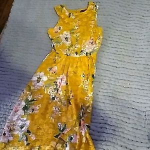 A yellow floral pattern dress